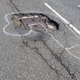 Illustration for article titled Hero Graffiti Artist Gets Potholes Fixed By Drawing Dicks On Them